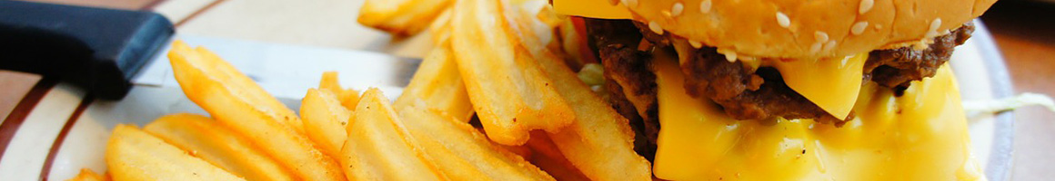 Eating Burger Sandwich Pub Food at Tower Tavern restaurant in Manitowoc, WI.